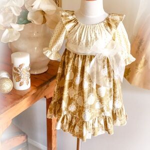 Holiday Party Dress in beautiful festive colors of cream and golds.  Size 18/24m